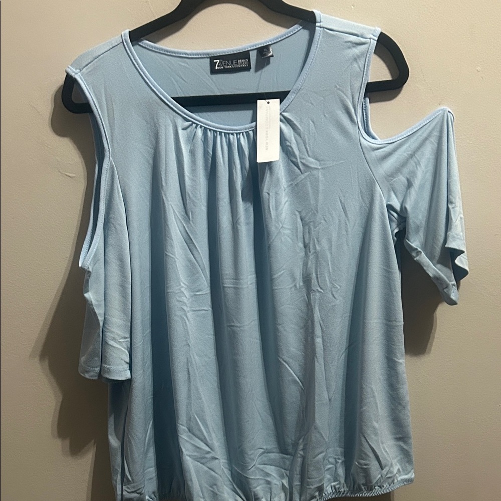 Major Blowout!!!!
New York & Company Light Blue Cold Shoulder Blouse.